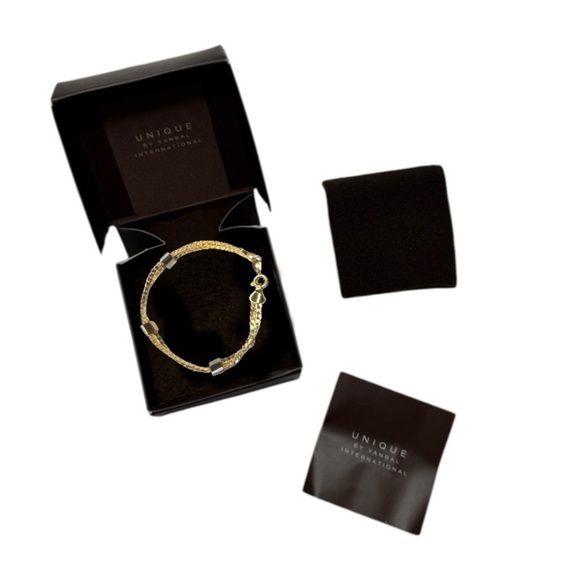 Yanbal International Jewelry - UNIQUE by Yanbal Gold Mixed Tone Spring Ring Bracelet NEW